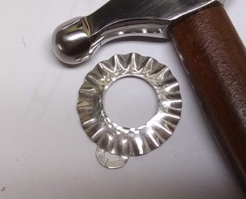 Judy Larson's Ripple Bracelet  - , Metalwork, Cutting, Cutting Tool, Cutters, Dapping, Dapping Jewelry, Filing, Finishing, Findings, Clasps, Components, Tumbling, Tumble, Tumbling Jewelry, Butane Torch, Soldering, Solder, Tools, texture the area around the center opening of the ring.